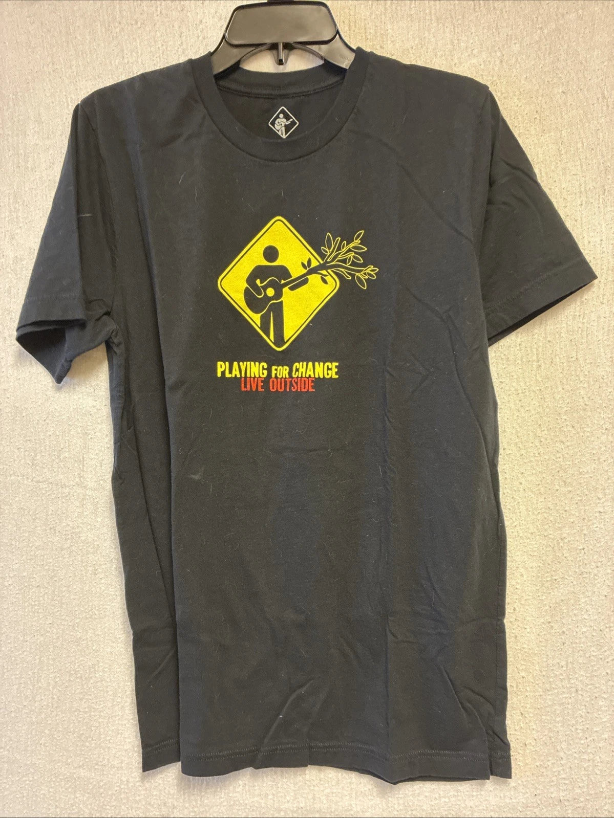 Men’s Black, L Short Sleeve T Shirt.  Bright Yellow Logos. Excellent Condition.